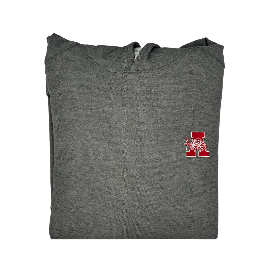 Pine Hoodie with Hog in front of A Iron Walker Brothers